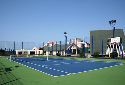 Outdoor tennis court for personal usage in Shuvalan settlement